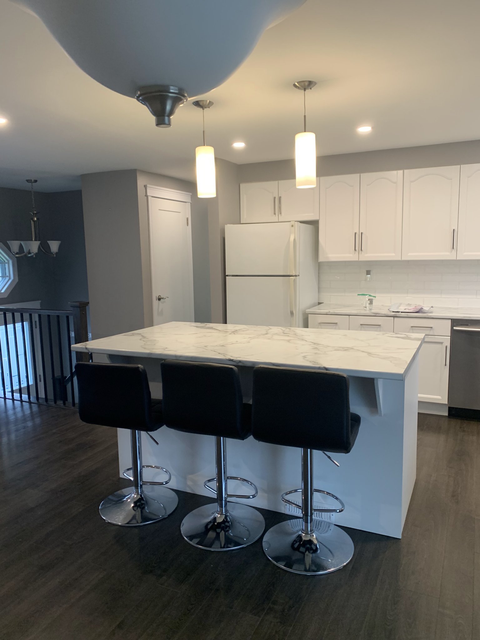 Kitchen Remodel — Marble Island & White Cabinetry